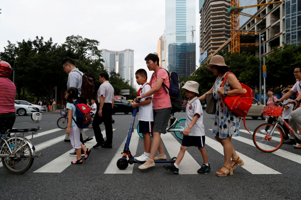 In China’s high-pressure educational environment, parents have little choice but to rely on outside tutoring just so their children can keep pace. — Reuters pic