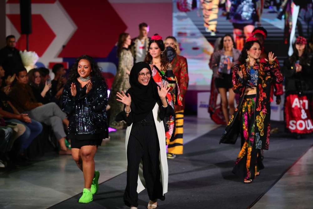 Limkokwing University students showcase their masterpiece fashion collection during the
post-show discussion. — Picture by Limkokwing