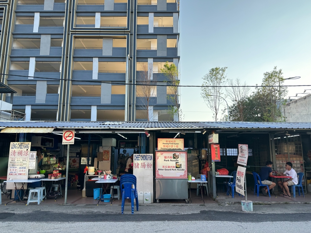 These row of stalls have been around for many years and some businesses open in the evening . — Picture by Lee Khang Yi