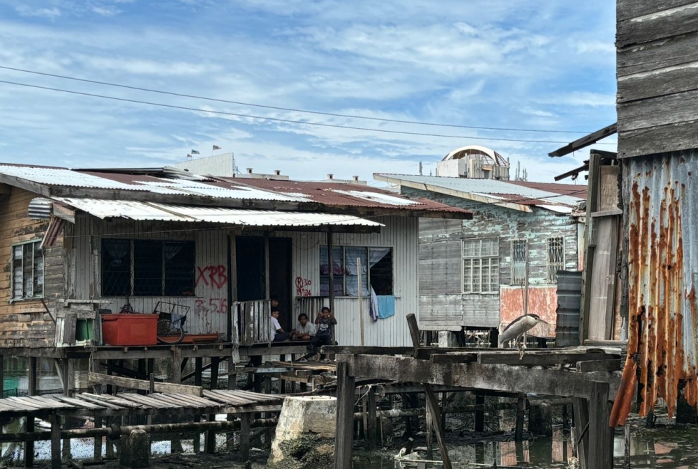 Generations of stateless people in Sabah, including the state capital Kota Kinabalu, are born into poverty and live impoverished lives and are challenged to improve their future. — Picture by Julia Chan