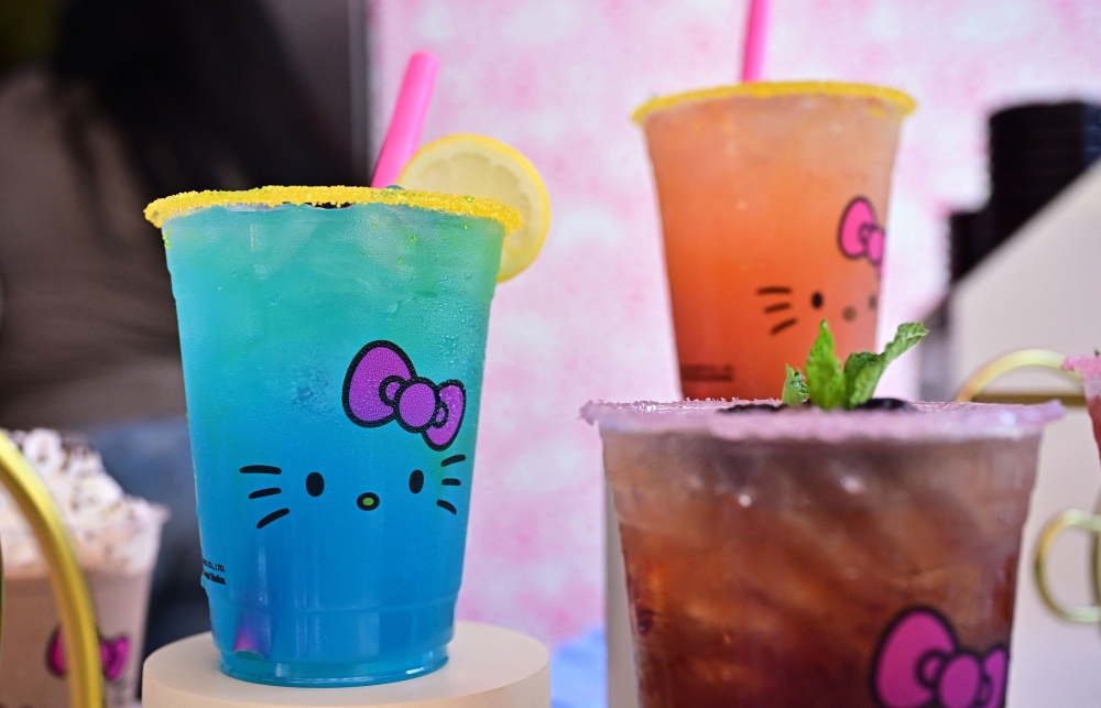 This picture taken on September 6, 2024 shows beverages on display, including the blue Tuxedosam Lemonade, at the Hello Kitty and Friends Cafe on its opening day at Universal Studios Hollywood in Universal City, California. — AFP pic