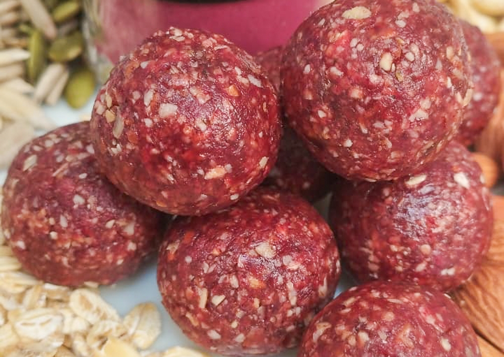 Vibrant beetroot energy balls packed with dates, nuts and seeds, kissed with cardamom and ghee. — Picture courtesy of Uthayasangari