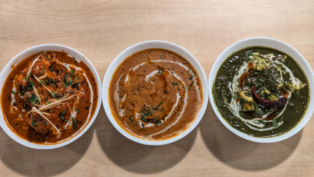 A fitting trio of Chicken Changhezi, Daal Makhani and Palak Paneer to round out the meal. — Picture by Ethan Lau