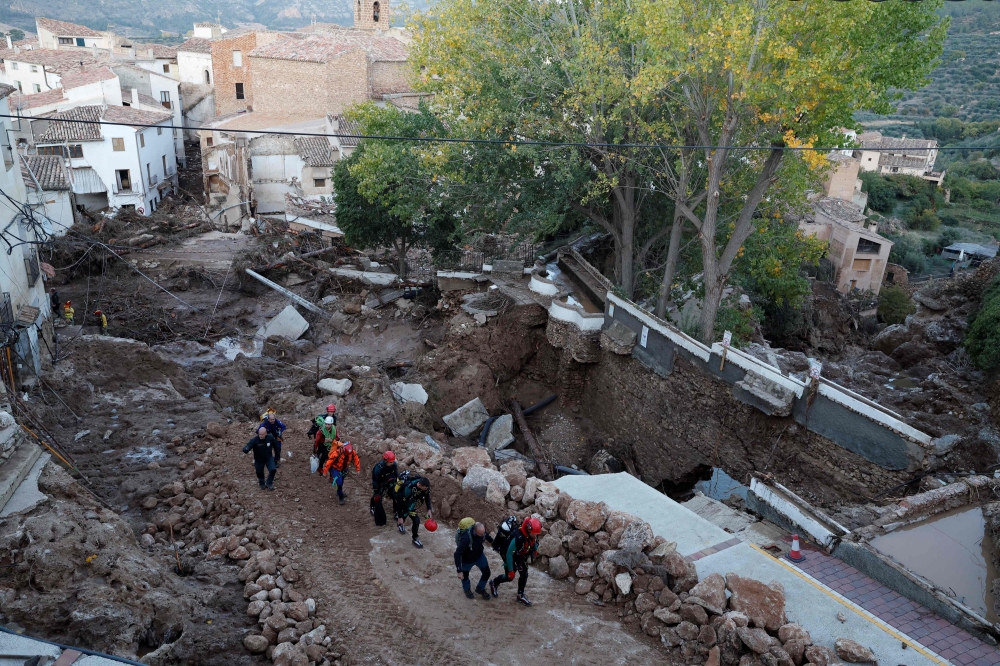 Rescuers were expected to find more bodies in the European country’s deadliest flood in more than 50 years and three days of official mourning are due to start today. — AFP pic