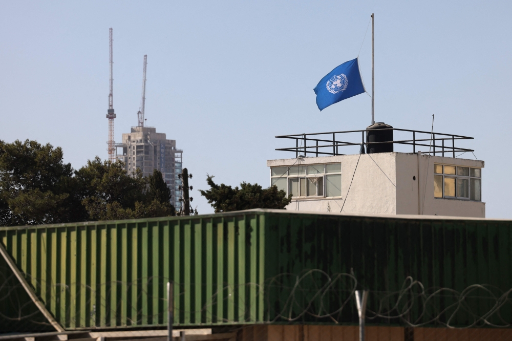 The flag of UNRWA (United Nations Relief and Works Agency) flies over their West Bank Field Office in Jerusalem on October 29, 2024. — AFP pic