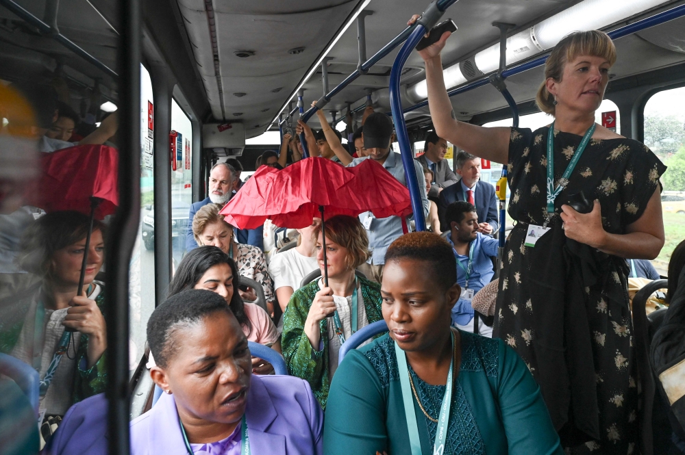 Environmentalists commute on a local bus to the blue zone of the COP16 summit in Cali, Colombia, on October 30, 2024. — Reuters pic  