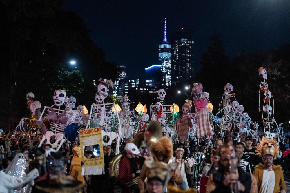 Revellers march in costumes during the 51st Annual Halloween Parade in lower Manhattan, New York October 31, 2024. — AFP pic