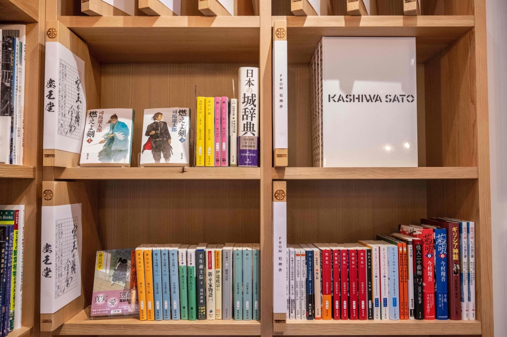 This picture taken on July 18, 2024 shows a bookshelf at bookstore ‘Honmaru Jimbocho’ in Tokyo. — AFP pic