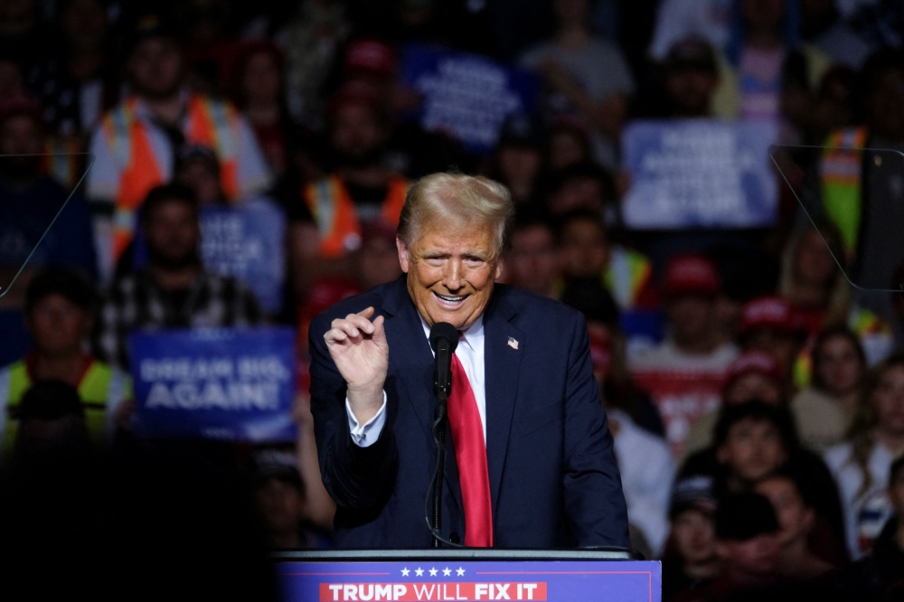 Republican presidential nominee and former US President Donald Trump gestures as he campaigns in Milwaukee, Wisconsin, US November 1, 2024. — Reuters