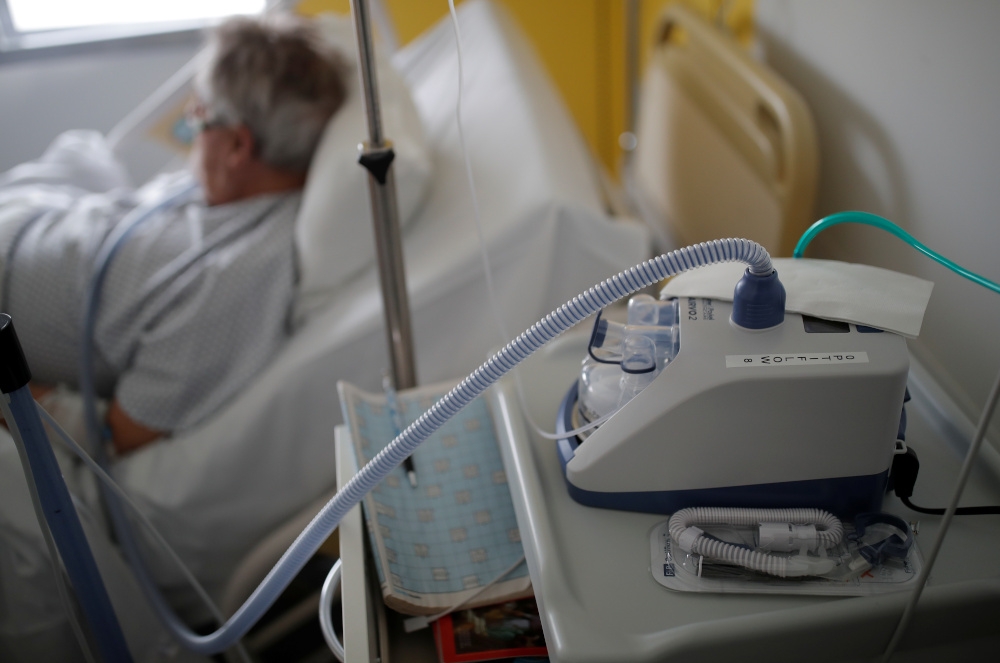 A nasal ventilator is pictured as a patient suffering from coronavirus is treated in a pulmonology unit at the hospital in Vannes, France, March 20, 2020. — Reuters pic