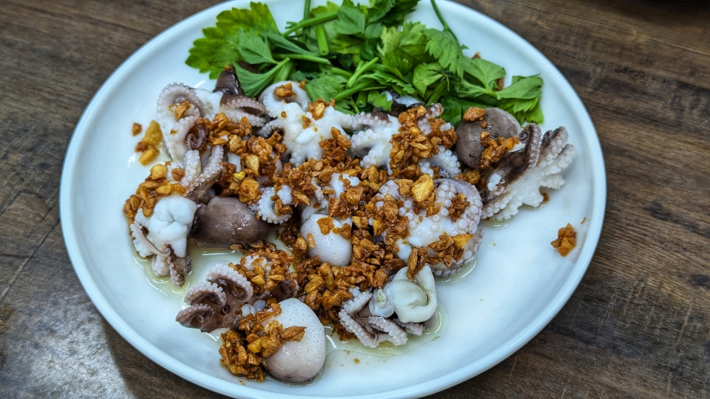 Poached baby octopus is a Teochew classic that makes for a good snack. — Picture by Ethan Lau