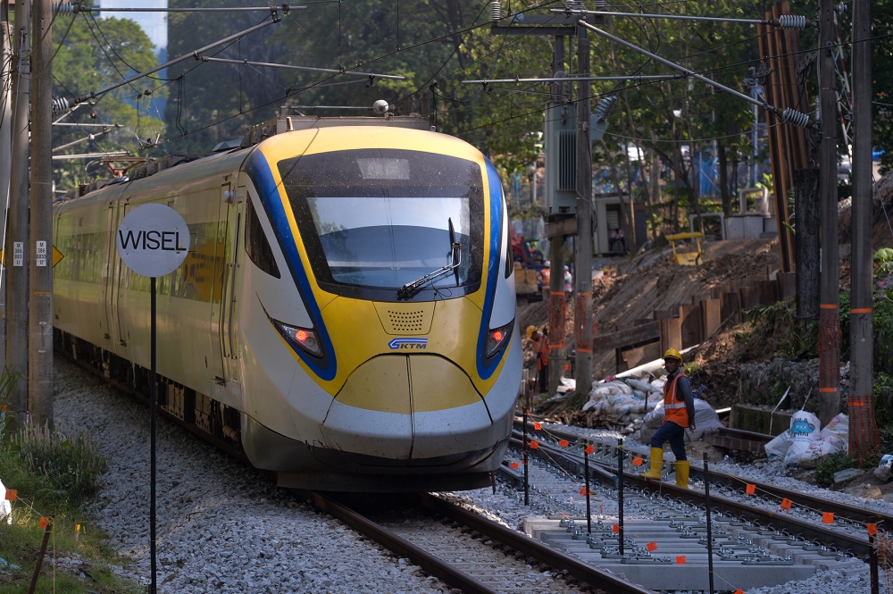 A file photograph shows a Keretapi Tanah Melayu Berhad Electric Train Service locomotive. The Gemas-Johor Baru electrified double-track rail project (Gemas-JB EDTP), expected to halve travel time between Kuala Lumpur and Johor Baru, has encountered further delays. — Picture by Mukhriz Hazim