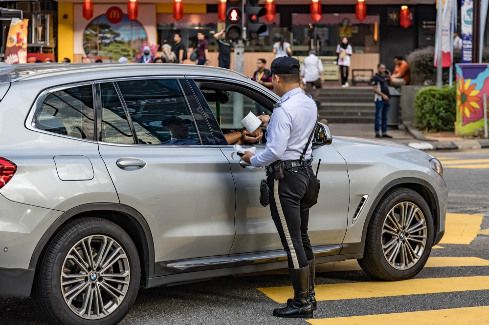 Kuala Lumpur Traffic Investigation and Enforcement Department chief ACP Mohd Zamzuri Mohd Isa said the public may head to counters at the Tun HS Lee Police Station to pay their fines via cashless payments. — Picture by Firdaus Latif