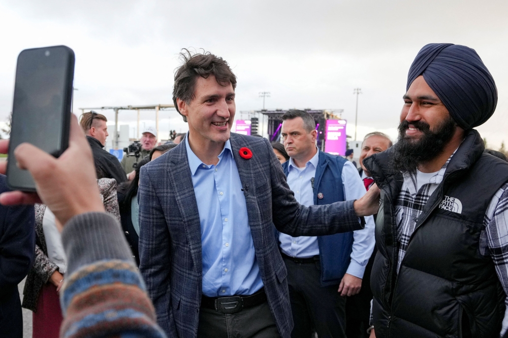 Canada's Prime Minister Justin Trudeau interacts with the crowd as he visits the Diwali Mela event in Brampton, Ontario, Canada, November 1, 2024. — Reuters pic