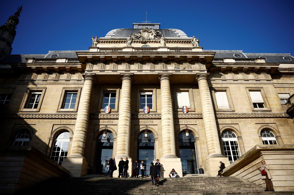 The father of a French pupil whose account of the use of caricatures of the Prophet Mohammad in a class on free speech led to the teacher’s brutal murder went on trial on Monday, accused of association with a terrorist network. — Reuters pic