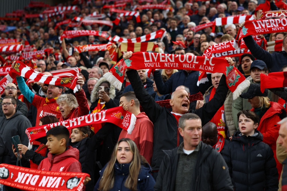 Liverpool fans are pictured inside Anfield ahead of their team’s match against Brighton. — Reuters pic