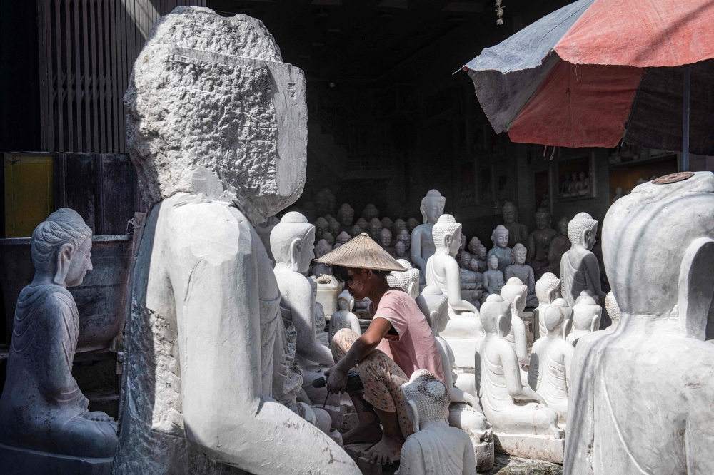 The rebels have seized the hillside quarries that have for generations provided the marble that adorns Mandalay’s palaces and monasteries, as well as the shrines in ordinary homes. — AFP pic