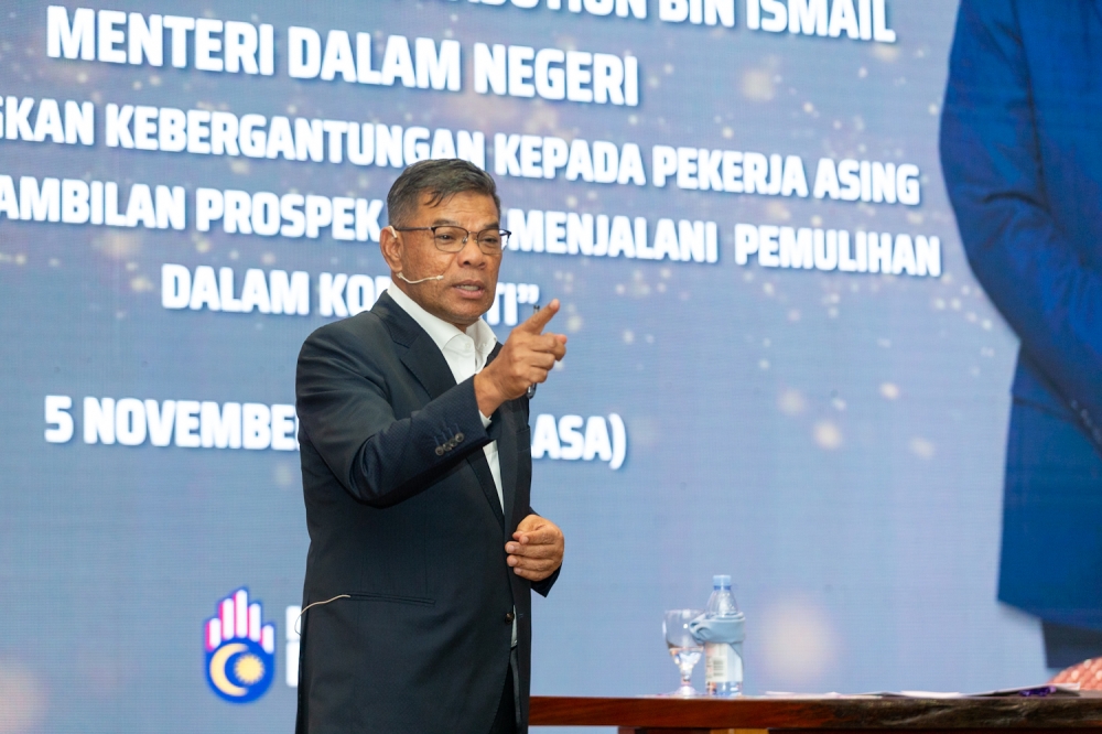 Datuk Seri Saifuddin Nasution speaks at a town hall session addressing efforts to reduce reliance on foreign workers through community rehabilitation programs in Kajang. November 5, 2024. — Picture by Raymond Manuel