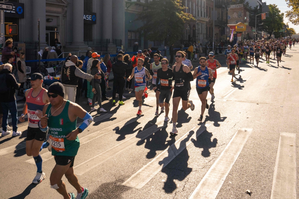 Runners compete in the New York Marathon in New York City on November 3, 2024. — AFP pic