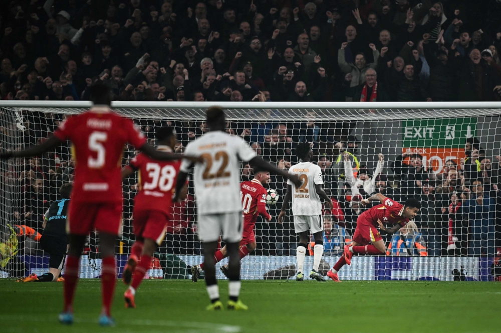 Liverpool’s Luis Diaz celebrates after scoring his team first goal during the Uefa Champions League match with Bayer Leverkusen at Anfield stadium in Liverpool November 5, 2024. — AFP pic