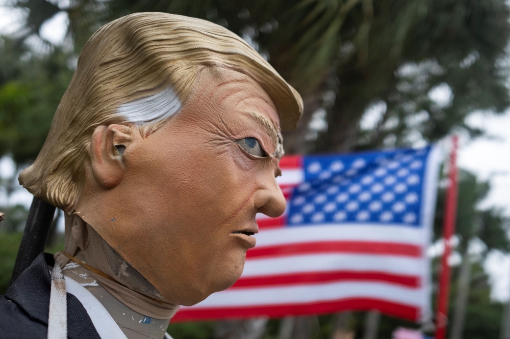 A dummy depicting Republican presidential nominee and former US President Donald Trump is seen outside a polling station during the 2024 US presidential election on Election Day in West Palm Beach, Florida November 5, 2024. — Reuters pic 