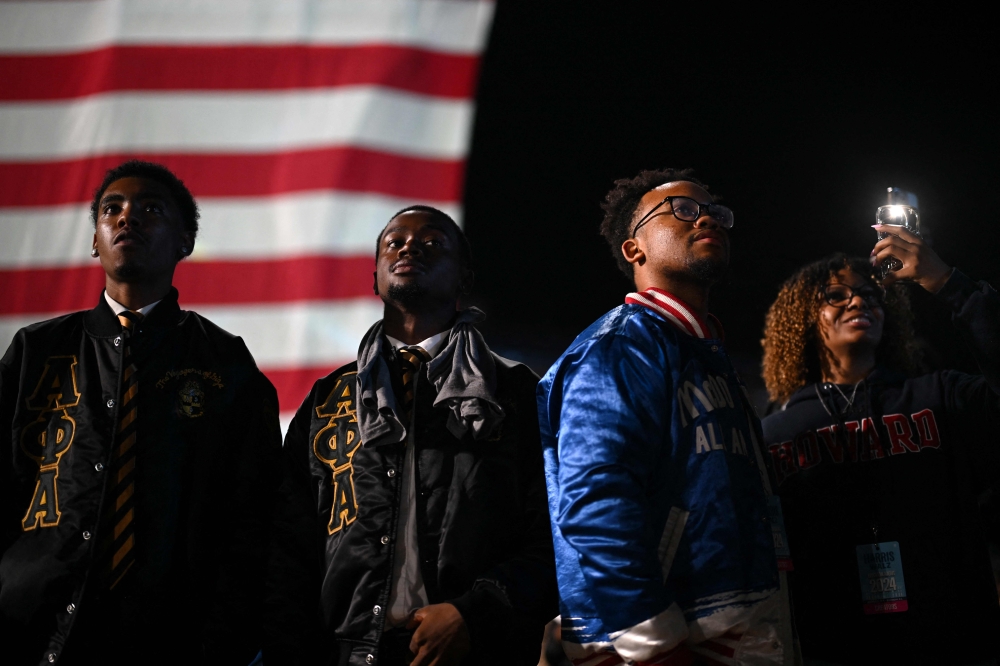 People attend an election night event for Democratic presidential nominee, US Vice President Kamala Harris at Howard University in Washington November 5, 2024. — AFP pic