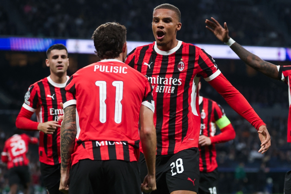 AC Milan’s Malick Thiaw celebrates scoring their first goal during the Uefa Champions League match with Real Madrid at the Santiago Bernabeu stadium in Madrid November 5, 2024. — AFP pic