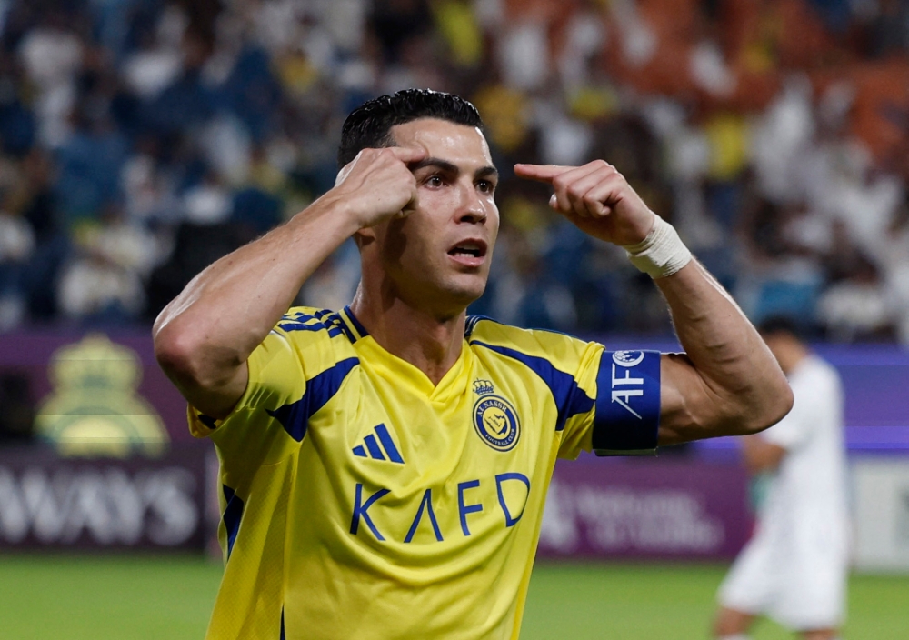 Al Nassr’s Cristiano Ronaldo celebrates scoring their second goal during the Asian Champions League Group B match with Al Ain in Riyadh November 5, 2024. — Reuters pic