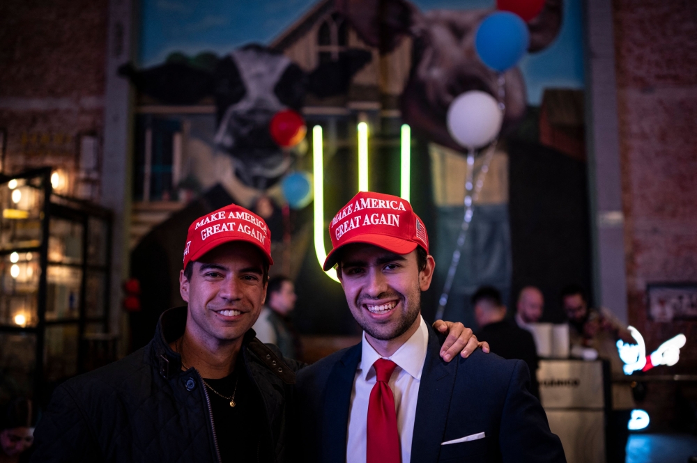 Supporters of US presidential candidate Donald Trump pose for a picture as they follow the US election results in Mexico City November 5, 2024. — AFP pic