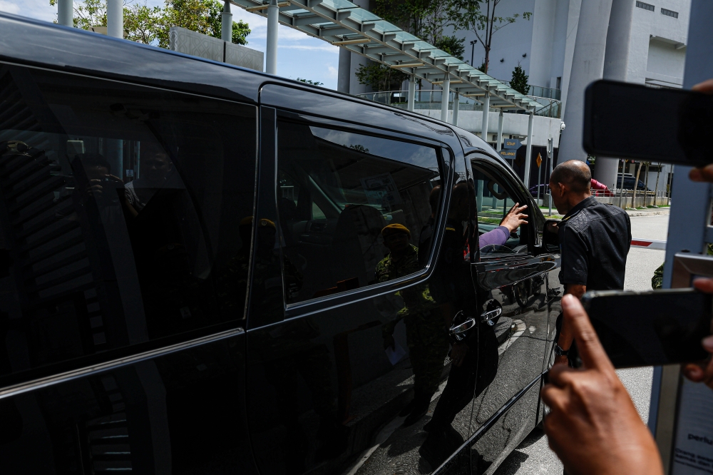 The car carrying the couple was spotted arriving at the MACC headquarters here at 12.54 pm. — Bernama pic