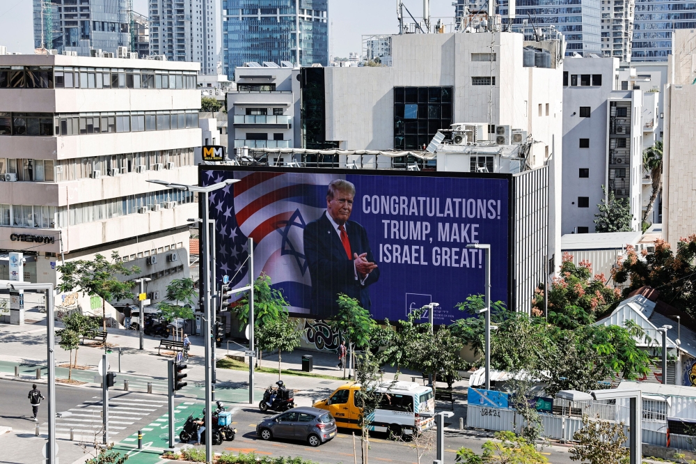 A Trump presidency is seen strengthening the US dollar, with investors expecting his policies to lead to higher inflation and growth than would have been the case under Democrat Kamala Harris. — Reuters pic