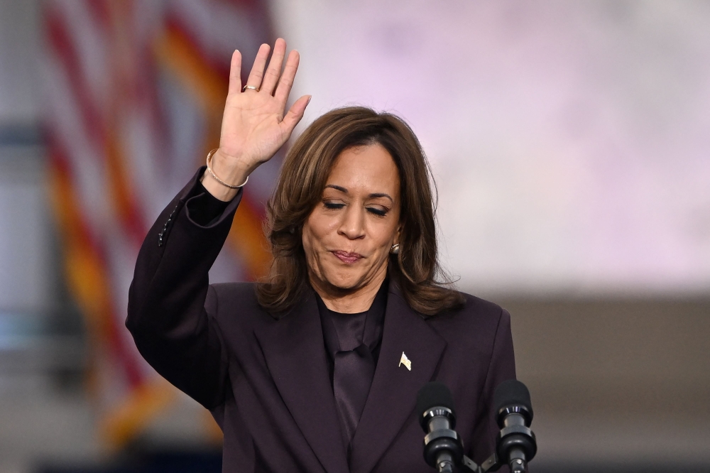 US Vice President and Democratic presidential candidate Kamala Harris waves at supporters at the end of her concession speech at Howard University in Washington November 6, 2024. — AFP pic