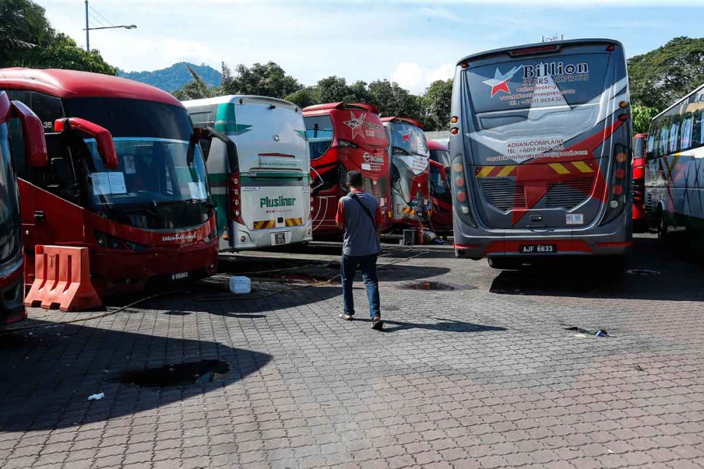 Remember to bring your own charger when travelling by express bus for now. — Picture by Sayuti Zainudin