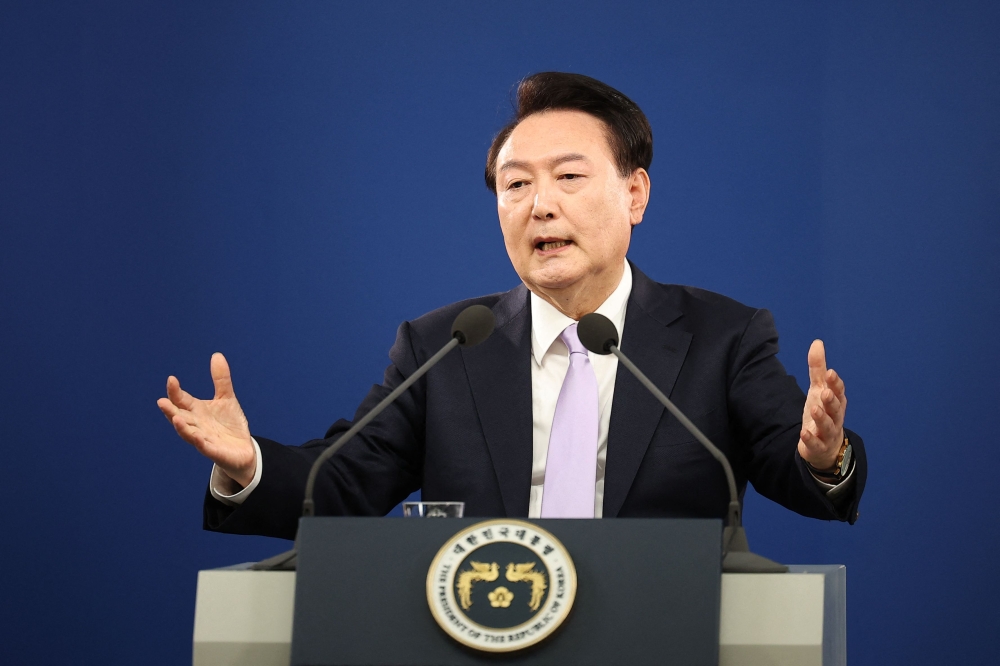 South Korean President Yoon Suk-yeol answers a reporter's question during a press conference at the Presidential Office in Seoul on November 7, 2024. Major arms exporter South Korea is not ruling out providing weapons directly to Ukraine, Yoon said, signalling a possible shift in Seoul's stance on the issue. — AFP pic