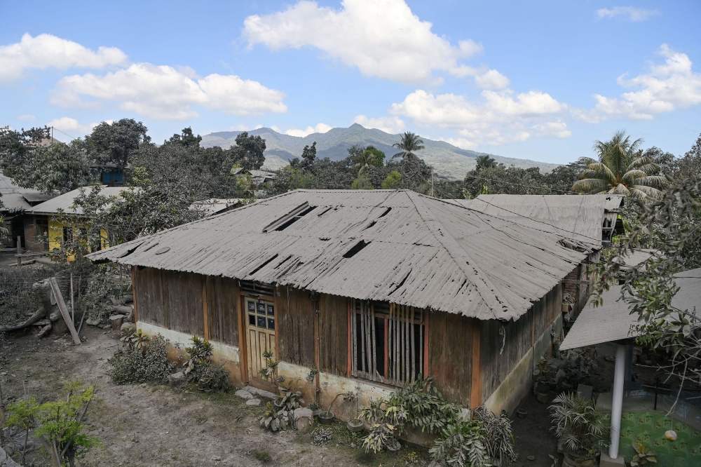 Residential areas covered by volcanic ash are seen following the Mount Lewotobi Laki-laki volcano eruptions in East Flores regency, East Nusa Tenggara province, Indonesia, November 6, 2024. — Reuters pic