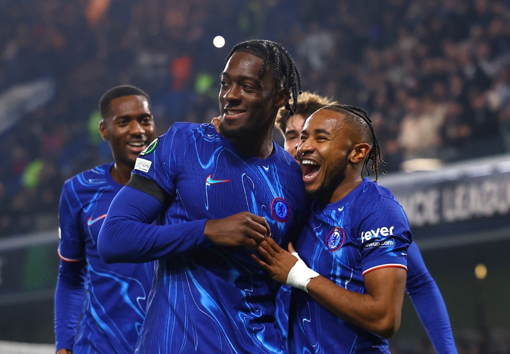 Axel Disasi celebrates scoring Chelsea's third goal with Christopher Nkunku. — Reuters