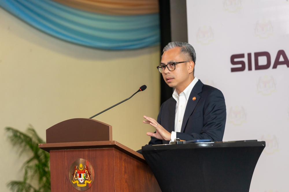 Communications Minister Fahmi Fadzil said this comes after the recent amendment to the Audit Act 1957, which now allows any entity receiving public funds to be audited. — Picture by Raymond Manuel