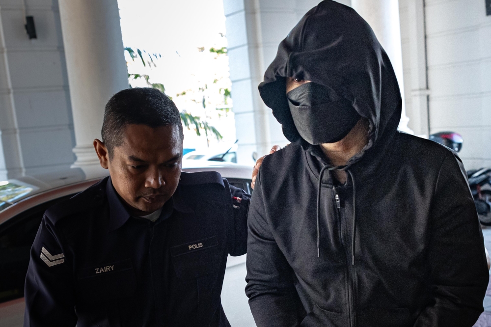 Mohd Nazri, 45, is accused of murdering Muhammad Zaharif Affendi on Jalan Taman Jati 1, near Sekolah Menengah Kebangsaan Jati, between 11.45 am and 12.40 pm on December 15, 2023. — Bernama pic