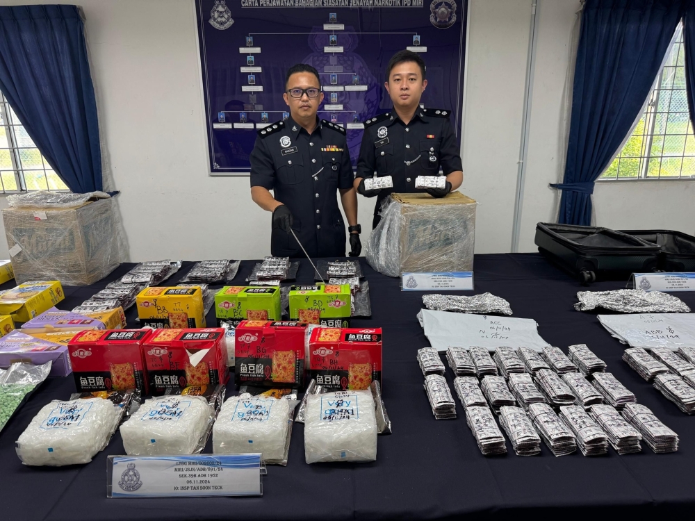 Sarawak police found 10.83kg of Eramin 5 pills, 4.1kg of ecstasy pills, and 7kg of syabu, with an estimated total value of RM1,991,700. — Picture from Facebook/Polis Sarawak