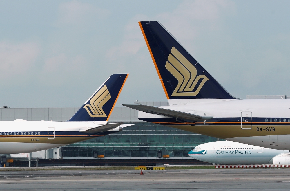 Singapore Airlines’ posted a 48.5 per cent plunge in net profit to S$742 million (RM2.46 billion) for the April-September period and declared an interim dividend of 10 Singapore cents per share. The group reported net profit of S$1.44 billion a year ago. — Reuters pic