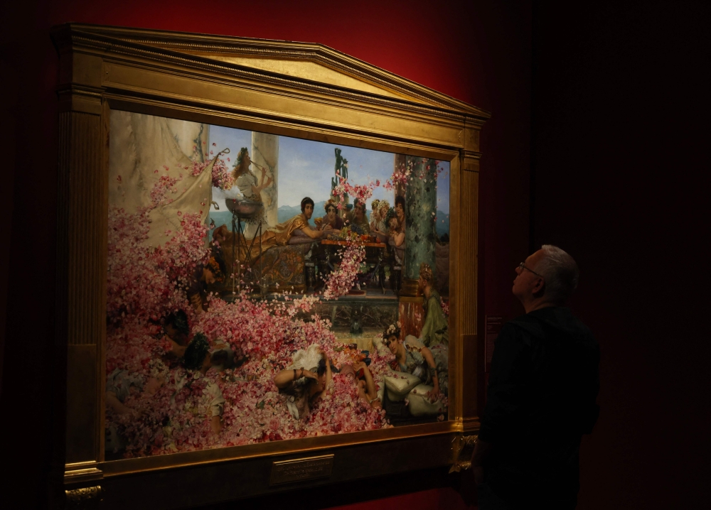 A man watches a painting by Lawrence Alma Tadema at the exhibition of Juan Antonio Perez Simon private collection in Madrid on September 26, 2024. Simon Perez's lifelong passion for art has led to a collection boasting 4,000 paintings, drawings, sculptures and decorative objects by masters such as Van Gogh, Sisley, Picasso, Rubens, Goya, Monet, Renoir, Magritte and Rothko. — AFP pic