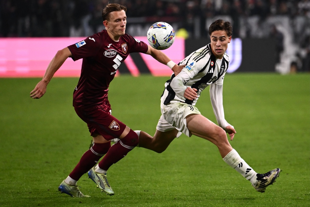 Juventus Timothy Weah and Kenan Yildiz edged a tense derby against city rivals Torino 2-0 on Saturday to move within one point of the summit of Serie A. — AFP pic