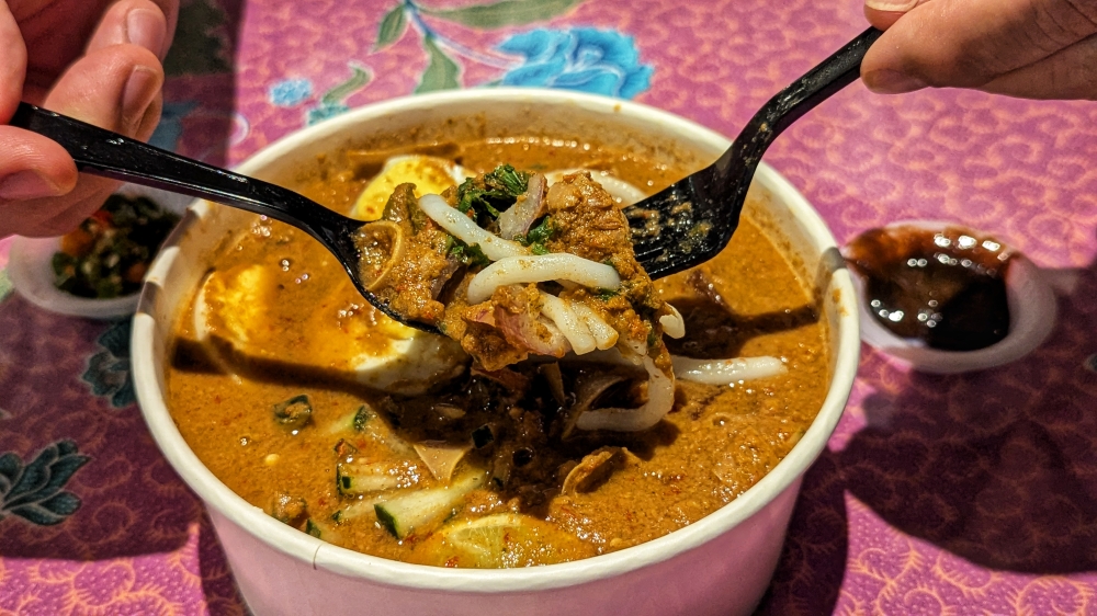 The ‘laksa utara’ was the real highlight of the night. — Picture by Ethan Lau 