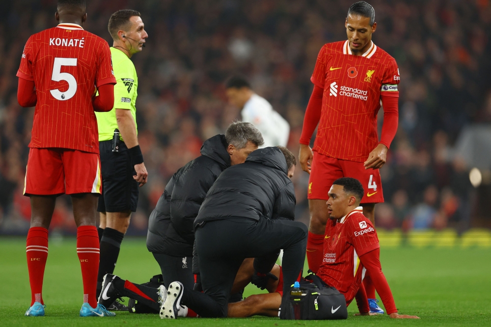 Trent Alexander-Arnold’s injury cast a shadow over Liverpool’s 2-0 Premier League win at home to Aston Villa on Saturday, with the English defender being taken off in the first half. — Reuters pic