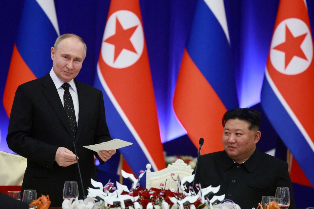 Russian President Vladimir Putin signed into law a treaty on the country’s strategic partnership with North Korea which includes a mutual defence provision, according to a decree published on Saturday. — Reuters pic