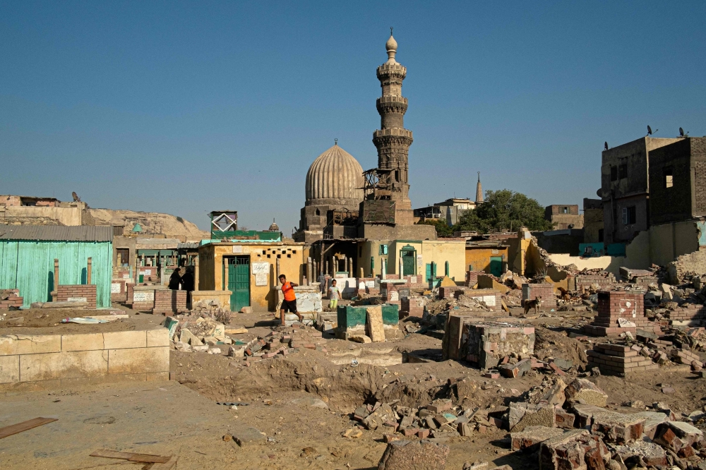 This picture taken on June 24, 2023, shows a partial view of demolished structures near the Khanqah (Sufi place of religious gathering) of Qawsun (Qusun), built around 1336, in Sayyida Aisha cemetery in Egypt's capital Cairo, as part of an ongoing government project to construct new roads and infrastructure. — AFP pic