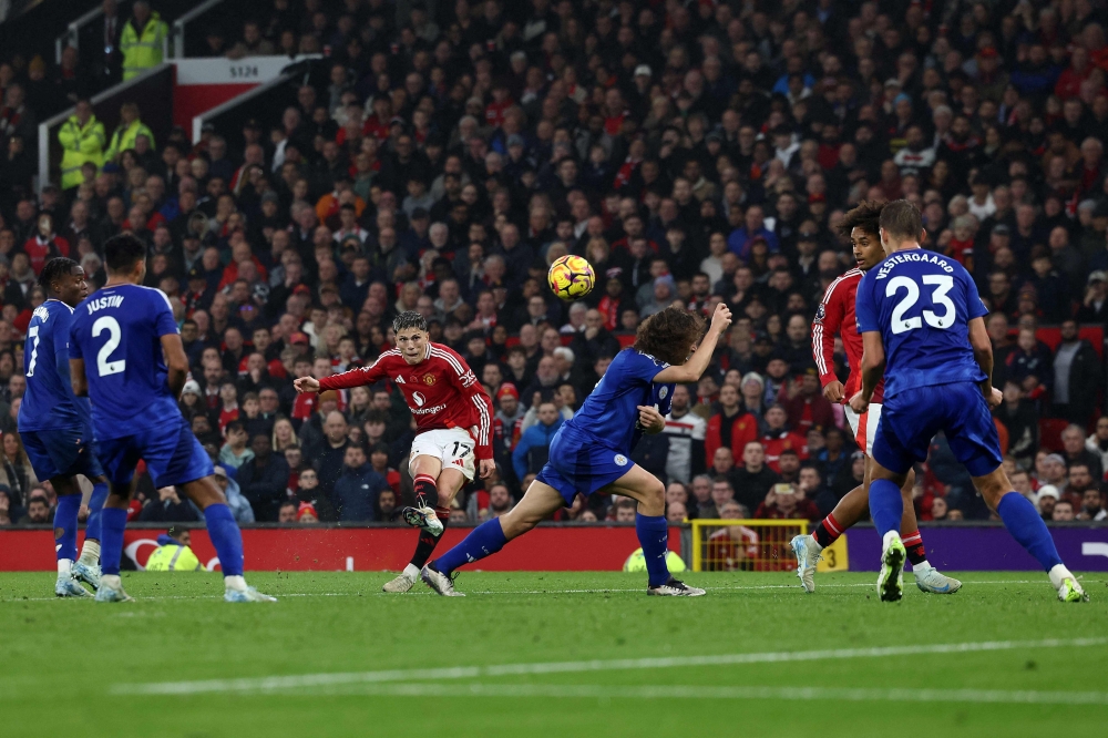 Manchester United's Argentinian midfielder #17 Alejandro Garnacho scores a goal during the English Premier League football match between Manchester United and Leicester City at Old Trafford in Manchester, north west England, on November 10, 2024. — AFP pic