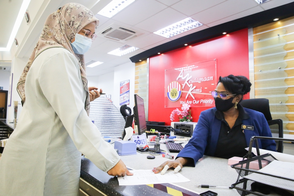 You can get free advice for retirement planning and on EPF withdrawals from EPF’s Relationship & Advisory (RA) officers at all 69 EPF branches throughout Malaysia. File pix of EPF’s Shah Alam office in November 2020. — Picture by Yusof Mat Isa