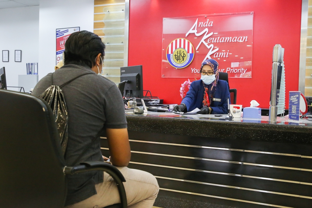 EPF’s trained RA officers can give you free advice on how to balance your immediate financial needs with planning for your retirement. File pix of EPF’s Shah Alam office in November 2020. — Picture by Yusof Mat Isa