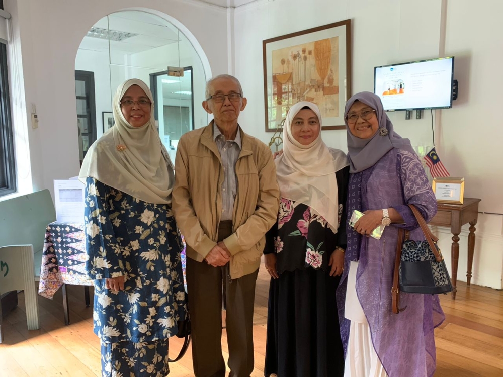 Prof Ezrin (second from left) with the authors at a recent gathering. — Picture courtesy of the authors